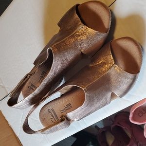 Women's Clark's Collection gold wedge slip on.  Size 8